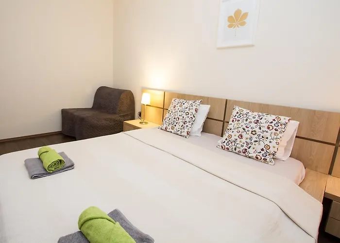 Апартаменты Elmenykoezpont Веленце